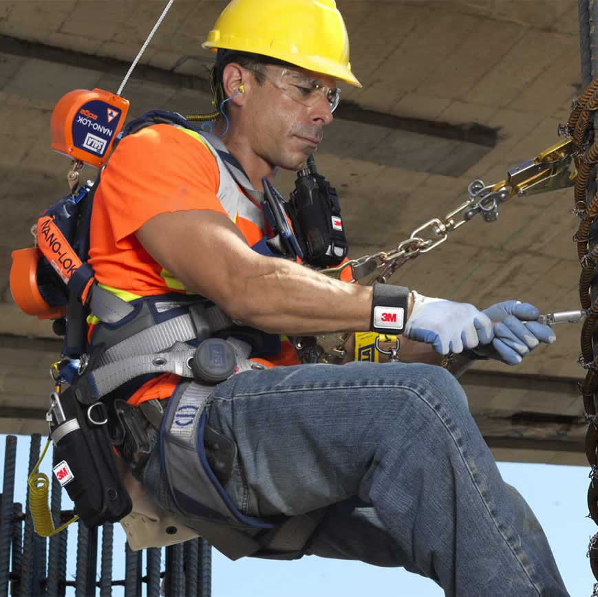 safety-equipment-fall-arrest workjer wearing safety harness with fall arrest device